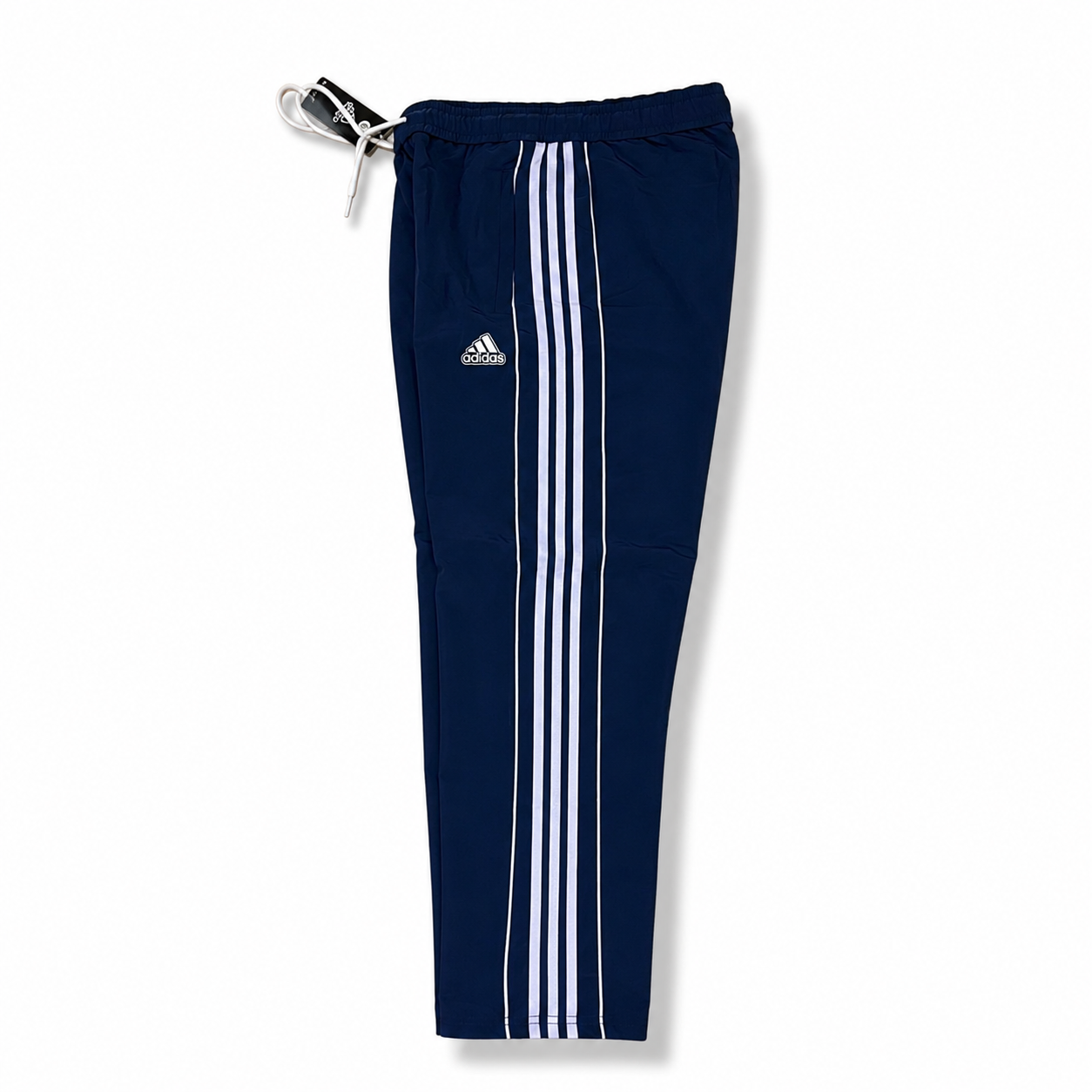 Adidas Essentials 3-Stripes pants, featuring a slim fit Navy Blue