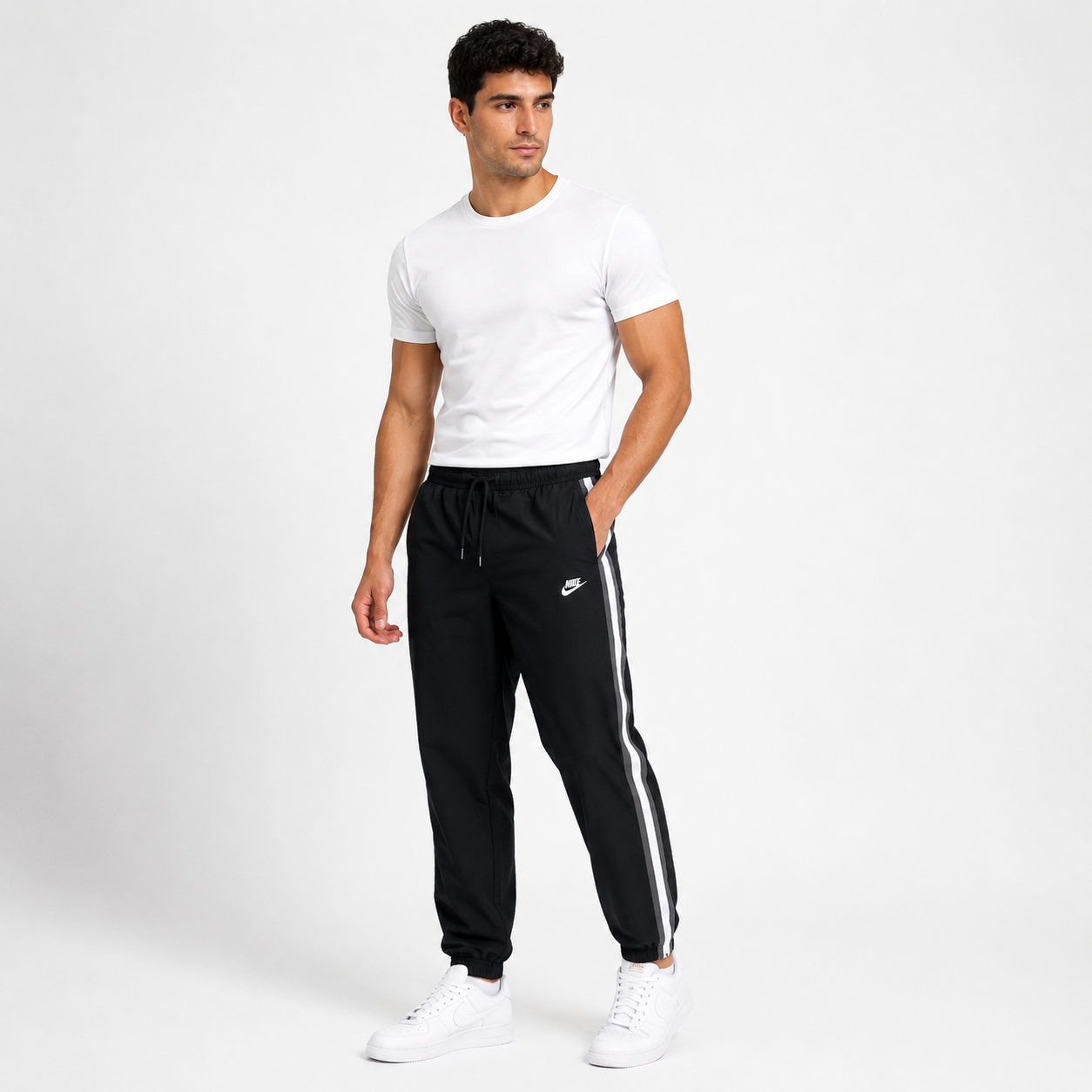 Nike pants feature a classic white side stripe design