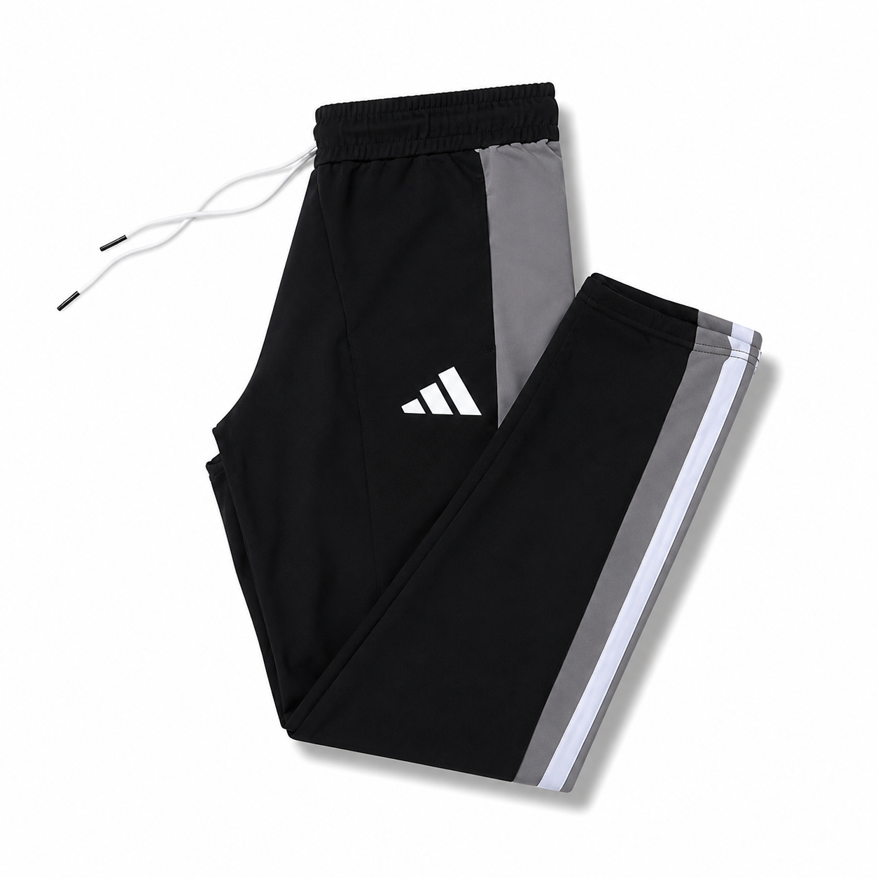 Adidas Tiro training pants featuring classic three-stripe