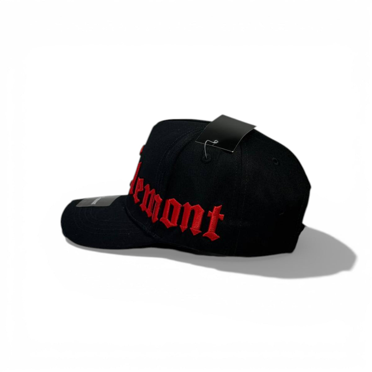 Clemont accessory cap featuring red embroidered gothic lettering